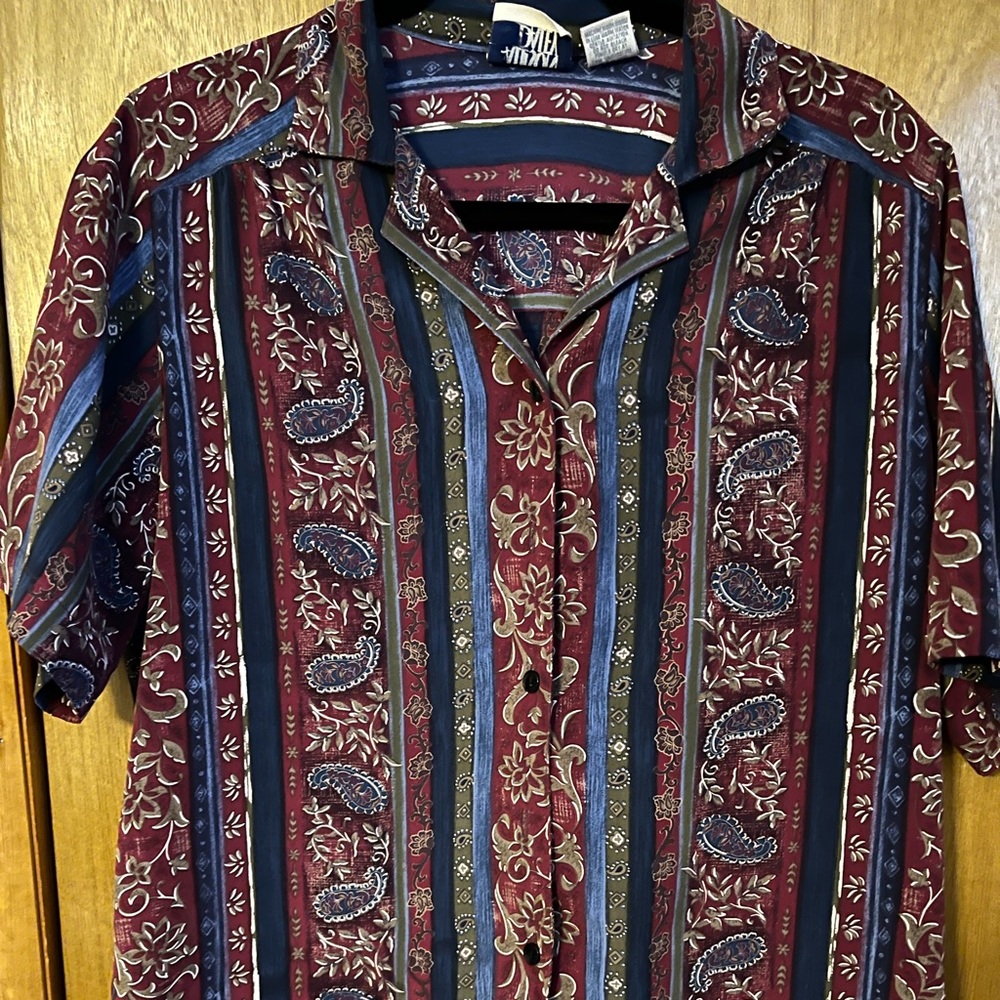 Size 10 on tag, fits like medium.